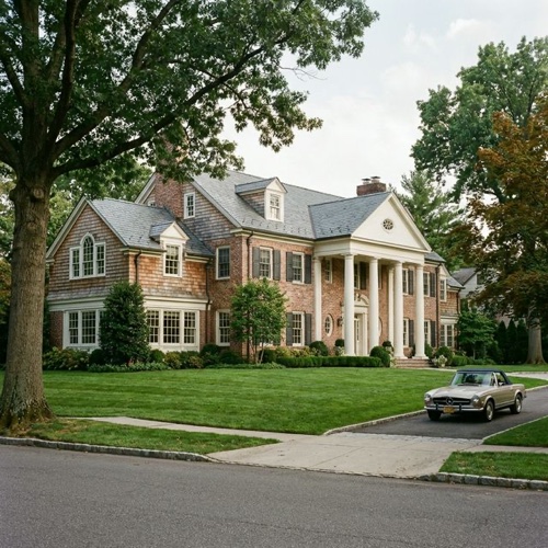 Grand brick colonial estate on a tree-lined Englewood New Jersey street